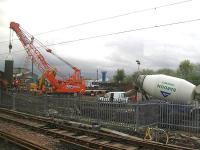 The former yard at the Salkeld Street Parcels Depot, now the scene of much activity as a place where concrete supports for the M74 extension scheme are in the process of being erected.<br><br>[Graham Morgan 23/04/2009]