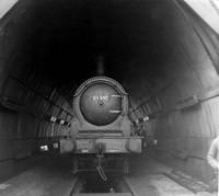 J36 no 65345 stands under the <I>maintenance canopy</I> at Thornton Junction on 11 June 1967, around 2 months after the shed had been officially closed to steam. [Railscot note: This surviving wartime structure, known as a <I>light tunnel</I> was introduced by the LNER to facilitate locomotive maintenance during the blackout. It was 80 ft long and had whitened walls, which were fitted with fluorescent lighting, as was the white glazed brick inspection pit. All lighting was cut off automatically whenever the doors fitted to each end of the tunnel were opened. Thornton men referred to it as <I>The snake pit</I>. [See <I>Living with Locos</I> by Charlie Meacher.]<br><br>[David Pesterfield 11/06/1967]