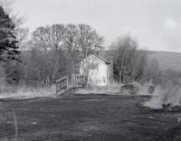 The former station building and platform at Oxton, photographed during a visit on 18 March 1987.<br><br>[Bill Roberton 18/03/1987]