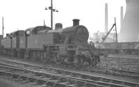 Fowler 3P 2-6-2T no 40070 stands in a siding at Willesden in 1959, near the end of its operational life. The locomotive was officially withdraw in March the following year and cut up at Derby works 2 months later.<br><br>[K A Gray //1959]