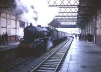 B1 4-6-0 no 61342 stands at the platform at Montgomerie Pier, Ardrossan, on 10 April 1966 with <I>Scottish Rambler No 5</I> from Glasgow Central.<br><br>[Robin Barbour Collection (Courtesy Bruce McCartney) 10/04/1966]
