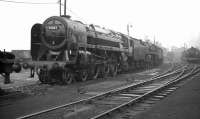Britannia Pacific no 70002 <I>Geoffrey Chaucer</I> sporting a 31B, March, shedplate stands at the north end of Doncaster shed in the summer of 1962, possibly following a visit to the nearby works.<br><br>[K A Gray 28/07/1962]