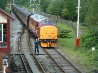 <I>For God's sake Jim don't make an ersk of this.... </I> numerous cameras get ready to 'capture the moment' as 37418 approaches the level crossing at Ramsbottom station on 5 July 2009, the occasion of the East Lancs diesel gala. <br>
<br><br>[Colin Alexander 05/07/2009]