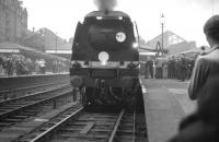 Bulleid <I>West Country</I> light Pacific no 34002 <I>Salisbury</I> stands at Nottingham Victoria on 13 August 1966. The locomotive is about to head south for Marylebone via the GC London Extension with the last leg of the RCTS <I>Great Central Railtour</I>.<br>
<br><br>[K A Gray 13/08/1966]
