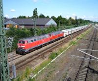A Hamburg bound express leaving Lubeck on 21 July hauled by DB 218 213-7.<br><br>[John Steven 21/07/2009]