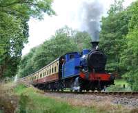 Andrew Barclay no 1245 leaves Newby Bridge Halt with the 13:00 departure from Haverthwaite to Lakeside on 22 June 2009.Built in 1911, no 1245 was rescued from the Kirkcaldy, Fife, scrapyard of Thomas Muir in 2004. <br>
<br><br>[Andy Carr 22/06/2009]