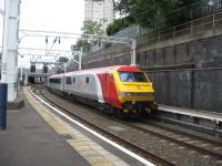 Virgin Trains have refurbished a mark III locomotive hauled set in 'Pendolino' style. The set is seen arriving at London Euston with DVT leading on 23rd July 2009.<br><br>[Michael Gibb 23/07/2009]