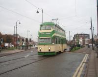 Blackpool <I>Balloon Car</I> No. 717 has been restored to original condition (apart from the pantograph replacing the trolley pole) and makes a fine sight entering the street running section in Fleetwood. Most of the remaining 1930s double deck tram cars have been either completely rebuilt or at least heavily modified [see image 23650]. <br><br>[Mark Bartlett 06/10/2009]