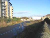 The site of Easter Road Park Halt, looking towards Leith on 31 Oct <br>
2009. This short-lived station on the Leith Central branch only handled specials for Hibernian FCs ground. Although the track was double it only had a platform on the Leith-bound side. This might explain why the halt saw arriving trains only: fans had to make their own way back! Well, that's one way of tackling fare-dodging.<br>
<br><br>[David Panton 31/10/2009]