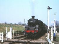 75014 departing Quorn & Woodhouse station on the Great Central Railway on 4 April 2002.<br>
<br><br>[Peter Todd 04/04/2002]