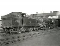 Class N15 0-6-2T no 69218 alongside Standard class 5MT 4-6-0 no 73108 on Eastfield shed in 1961.  <br>
<br><br>[Ken Browne //1961]