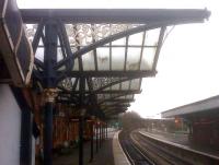 Awnings on platform 1 at Wellingborough in December 2009 - dirty, but unbowed. View looks North.<br><br>[Ken Strachan 09/12/2009]