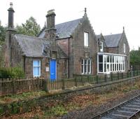 The impressive former station building at Beauly seen from the current mini-platform on 3 October 2009 looking towards Inverness. Nowadays the building is in use as a combination of office and residential accommodation.<br><br>[John Furnevel 03/10/2009]