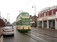 When current plans come to fruition Fleetwood will be served by new articulated light rail vehicles on all regular services. Blackpool's historic trams, such as restored 717 seen here entering Lord Street, will usually be confined to the central part of the system in Blackpool itself.  The former Woolworths store, now empty, fronts onto the street at this point. <br><br>[Mark Bartlett 06/10/2009]