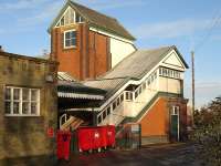 The imposing former Great Western Railway staircase and lift tower to the footbridge at the North end of Wrexham General station, photographed in December 2009. <br><br>[David Pesterfield 23/12/2009]