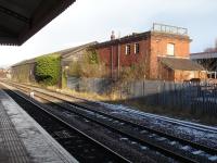 The old Great Western Railway Goods Shed (and later extension) still stands on the east side of line by Wrexham General Station. The former railway goods depot is now a builders merchants yard.<br><br>[David Pesterfield 22/12/2009]