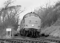 37240 approaching Braeside Junction from the north on 13 January 1993 with the second last train to RNAD Crombie. The warning notice at the end of the line running in on the left from the armament depot states clearly <I>MOD PROPERTY - NO RIGHT OF WAY</I>. <br><br>[Bill Roberton 13/01/1993]