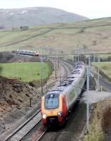 Voyagers passing between Tebay and Scout Green. View looks south to Tebay.<br><br>[Ewan Crawford 28/01/2010]