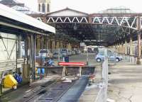 Looking south past the fuel road buffers into Perth station in February 2010. Platforms 8 & 9 originally continued under the canopy, a mirror image of platforms 5 & 6.<br>
<br><br>[Gary Straiton 26/02/2010]