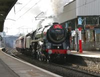 Britannia Pacific no 70013 <I>Oliver Cromwell</I> takes <I>The Roaring Monster</I> excursion north through Oxenholme on 19 March 2010 en route to Carlisle. <br><br>[John McIntyre 19/03/2010]