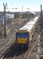 334 008 passes Ayr TRSMD on 19 March with an Ayr - Glasgow Central service.<br>
<br><br>[Bill Roberton 19/03/2010]