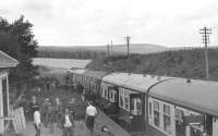 Grand Scottish Tour no 11 stands at Rothiemay on 5 September 1970 behind EE Type 4 no D364. [See image 28562]<br><br>[Bill Jamieson 05/09/1970]