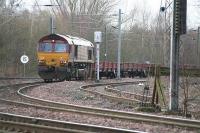 EWS 66080 reverses a trainload of ballast spoil for unloading at the mound at the top end of Millerhill yard in January 2006.<br><br>[James Young 25/01/2006]