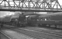 Gresley A3 Pacific no 60110 <I>Robert the Devil</I> speeds south through Doncaster with the 10.10am Waverley - Kings Cross in  September 1962 passing a York - Colchester train standing at the platform. <br><br>[K A Gray 01/09/1962]