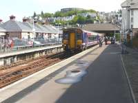 156 474 forming the 12.11 train to Glasgow Queen Street, awaits its departure time at Oban station on a very warm Sunday 23 May 2010.<br><br>[Ken Browne 23/05/2010]