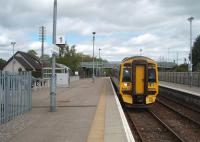 The 0812 service from Wick to Inverness, formed by 158716, stops at Muir of Ord on 19 May, a few minutes ahead of its scheduled 1155 arrival time.  <br><br>[Mark Bartlett 19/05/2010]