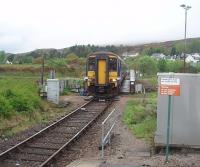 The 0603 from Mallaig crosses the Caledonian Canal swing bridge at the regulation 5mph and rolls in to Banavie station on time at 0718. 156456 will reverse at Fort William and go forward to Glasgow Queen Street where it is scheduled to arrive at 1130am. <br><br>[Mark Bartlett 19/05/2010]