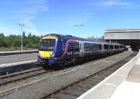 170 428 pulls out of Perth platform 4 on 31 May with an Inverness to Glasgow service.<br><br>[David Panton 31/05/2010]
