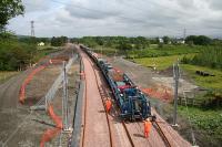 Tracklaying underway between Bathgate and Armadale on 9 June 2010.<br><br>[James Young 09/06/2010]
