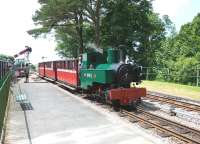 Arrival at Woody Bay on the Lynton & Barnstaple Railway on 27 June 2010, hauled by Kerr Stuart 0-6-0T <I>Axe</I>.<br><br>[Peter Todd 27/06/2010]