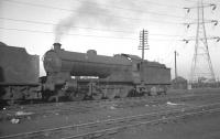 Raven Q7 0-8-0 no 63463 stands on Tyne Dock shed around 1960.<br><br>[K A Gray //1960]