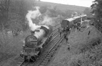 The SLS <I>Three Dales Railtour</I> stands at Westgate-in-Weardale on 20 May 1967. K1 2-6-0 no 62005 is in the process of running round the train, prior to taking the special on to journey's end at Middlesbrough.  <br><br>[Robin Barbour Collection (Courtesy Bruce McCartney) 20/05/1967]