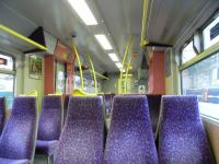 You've only a matter of months now to appreciate the kindegarten <br>
colour scheme of a Class 322 interior, seen here in July 2010. Only 5 of the class were ever built and all are operating on the North Berwick and Dunbar routes. Come March 2011 they'll return south from whence they came, and be replaced by new Class 380s, of which none has so far been delivered. <br>
 <br>
<br><br>[David Panton 14/07/2010]