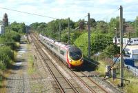 A southbound Virgin Pendolino, bound for London Euston, passes Coppull on 16 July 2010. The emergency crossovers have been removed from this location since my last visit in early 2009.<br><br>[John McIntyre 16/07/2010]