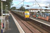On 27th July 2010 the 10.30 Glasgow Central - Ayr train runs into Barassie station for its 11.10 scheduled stop. [See image 21465 for the same viewpoint forty seven years earlier]<br><br>[Colin Miller 27/07/2010]