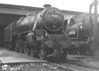 Black 5 no 44967 stands alongside BR Standard class 4 no 80110 on Eastfield shed in the early 1960s. <br><br>[Jim Peebles //]