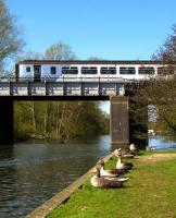 A National Express class 156 passes over the River Bure at Wroxham on 17 April 2010 with a service for Sheringham. <br><br>[Ian Dinmore 17/04/2010]