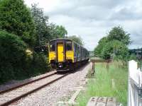 The track has been relaid since my last visit to Daisyfield [See image 26413]. 150207 runs onto the single line over the level crossing and through the closed station on its way from Clitheroe to Manchester.<br><br>[Mark Bartlett 08/07/2010]