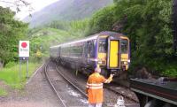 The 10.10 ex- Mallaig runs into Glenfinnan to cross 45231 on <I>The Jacobite</I> on 27 June 2010.<br><br>[Colin Miller 27/06/2010]