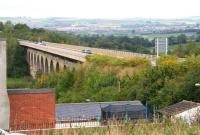 The impressive Newton Cap Viaduct, opened in 1857 to bring the North Eastern Railway route south from Durham over the River Wear into Bishop Auckland. The line and viaduct were closed in 1968. The structure has since been adapted to handle road traffic and now carries the A689. View north east towards Spennymoor in September 2010.<br><br>[John Furnevel 30/09/2010]