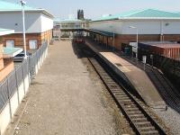 The relocated Wrexham Central single platform terminus looking east to the buffers on 22 April 2010. The station was formerly located some 100 metres beyond here at the far end of the retail park. [See image 30963]<br><br>[David Pesterfield 22/04/2010]