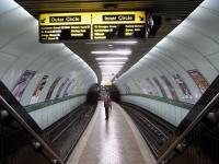 The bigger stations on the Glasgow Subway have platform walls in the <br>
same neutral colour and pale yellow signage strip. However no two <br>
single-island stations are in the same colour. Some are almost garish, but Cowcaddens, seen here on 27 November, has gone for a restrained mint green with an olive dado.<br><br>[David Panton 27/11/2010]