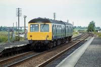 A Lowestoft to Norwich DMU calls at Haddiscoe (Low Level) on June 30th 1979. The platform lighting columns had been recycled from the former station at Yarmouth South Town - the name could be seen embossed on the lamp shades.<br><br>[Mark Dufton 30/06/1979]