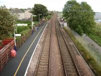 Looking east from the footbridge at Balmossie on 19 September 2007.  <br>
The shortness of the platforms exaggerates the stagger.  If one platform were to warrant a shelter it would be the Dundee-bound one, but the tiny number of people each year catching the daily train the other way do at least get a bench.  For a picture of one of those trains a few years earlier [see image 16711].<br>
<br><br>[David Panton 19/09/2007]