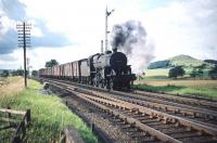 Carlisle Kingmoor's <I>Crab</I> 2-6-0 no 42905 is heading for home with an up freight on the WCML approaching Symington station on the first day of August 1959.<br><br>[A Snapper (Courtesy Bruce McCartney) 01/08/1959]