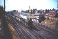 A class J37 0-6-0 passes Craigentinny signal box in the late 1950s heading south with a train of empties.<br><br>[A Snapper (Courtesy Bruce McCartney) //]